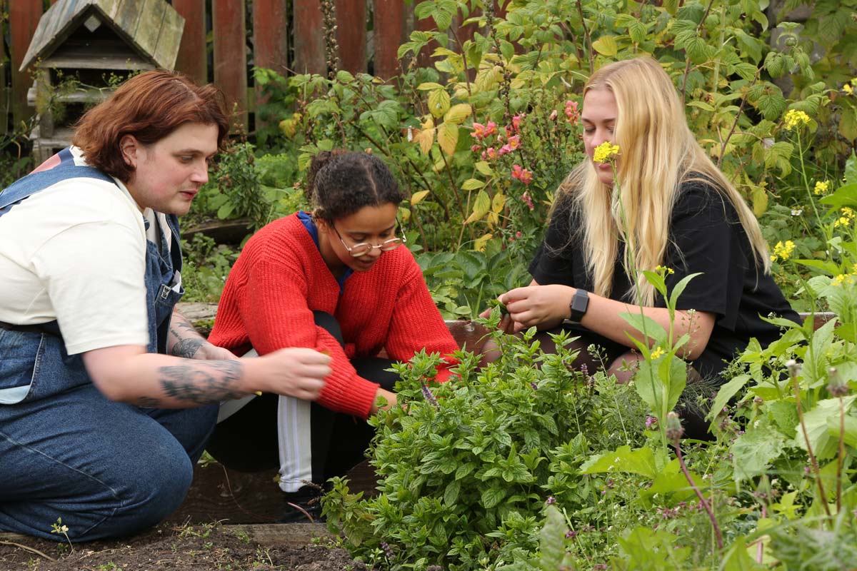 photograph of people in garden workshop